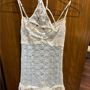 Sheer lace chemise with pleats and matching thong